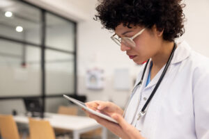Female Doctor Using Tablet