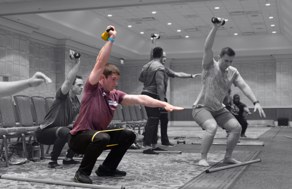 resistance training technique session at ACSM Summit, spot color