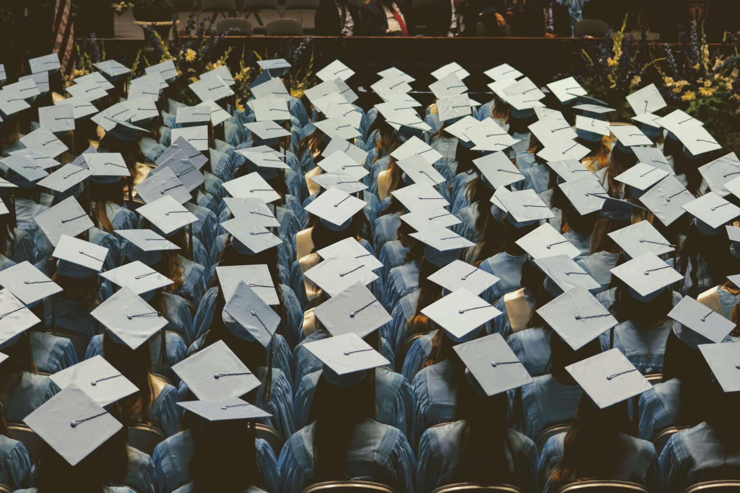 students in mortarboards