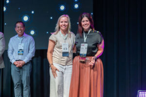 ACSM CEO Katie Feltman receiving ISAE Executive of the Year award 2026